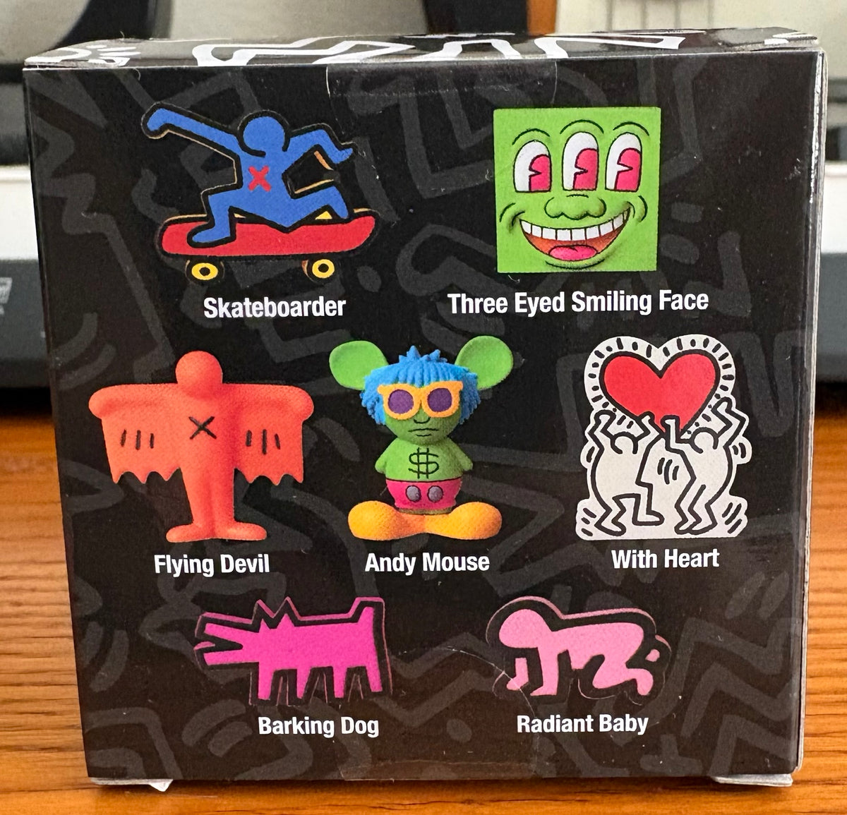 Actual item: box panel showing possible Keith Haring Series 3 designs