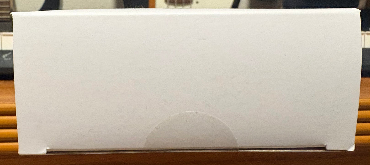 Actual opposite side of the Artist Series Six box, with circular closure sticker visible